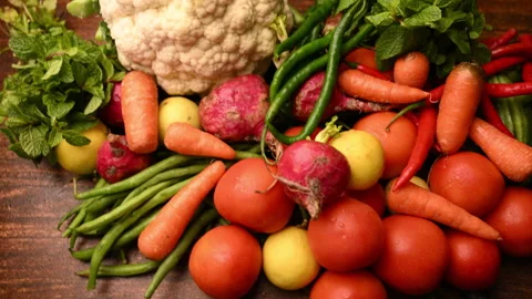 Fresh Organic Vegetables On Table - Tomatoes - Lemon - Cauliflower - Carrot Stock Footage 327511047