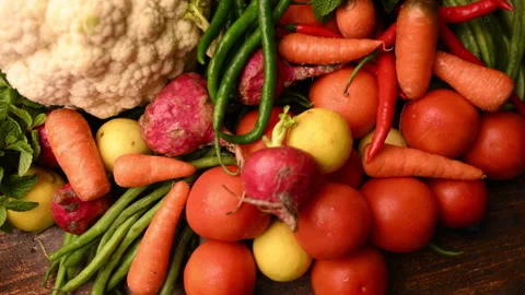Fresh Organic Vegetables On Table - Tomatoes - Lemon - Cauliflower - Carrot Stock Footage 327511068