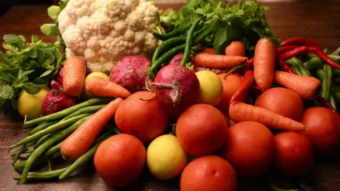 Fresh Organic Vegetables On Table - Tomatoes - Lemon - Cauliflower - Carrot Stock Footage 327511176