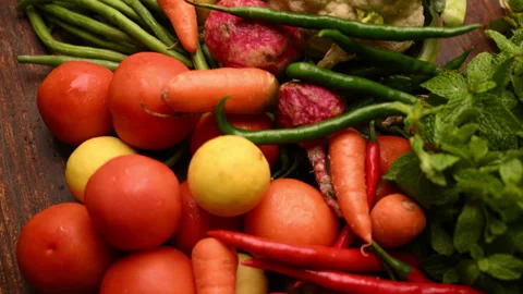 Fresh Organic Vegetables On Table - Tomatoes - Lemon - Cauliflower - Carrot Stock Footage 327514837