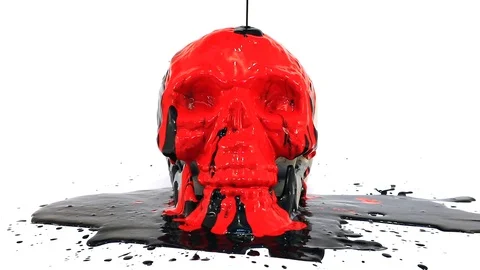Fresh paint dripping over a human skull with colors pouring and white background Stock Footage 116692343
