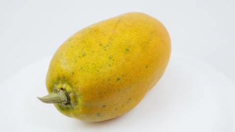 Fresh Papaya Rotating on White Background Stock Footage 326977597