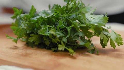 Fresh parsley herbs in a kirchen in zero waste eco bag. Healthy nutrition concep Stock Footage 309226447