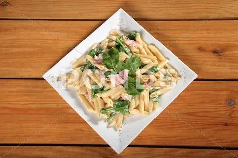 Fresh pasta with bacon Stock Photos