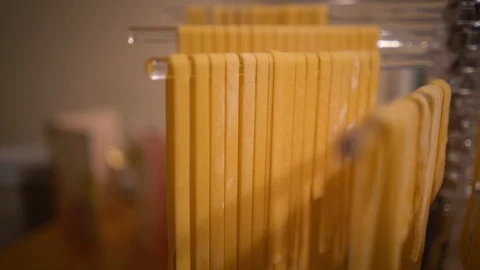 Fresh Pasta Hanging Up On Drying Rack Stock Footage 97276951