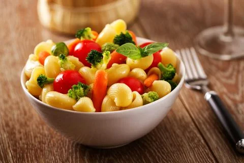 Fresh Pasta Salad with fresh vegetables. High quality photo Stock Photos