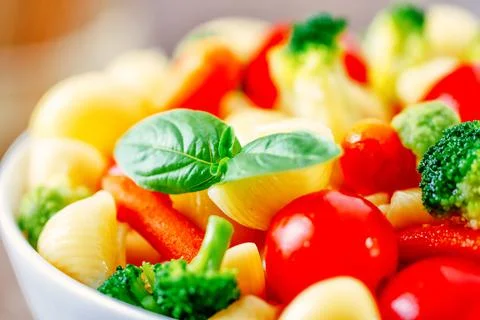 Fresh Pasta Salad with fresh vegetables. High quality photo Stock Photos