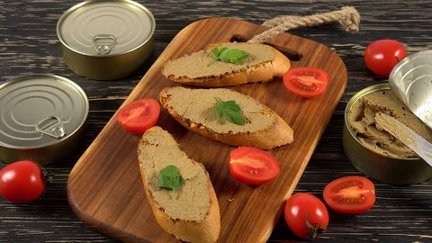 Fresh pate with bread on wooden table Stock Footage 74798667