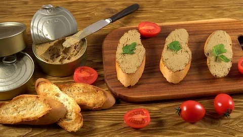 Fresh pate with bread on wooden table Stock Footage 74806337