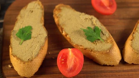 Fresh pate with bread on wooden table Stock Footage 74916425