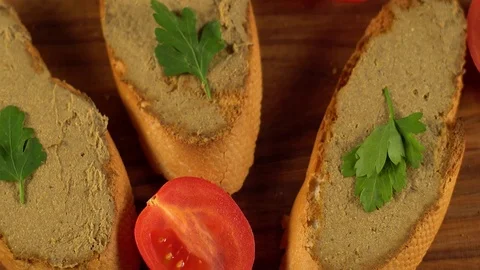 Fresh pate with bread on wooden table Stock Footage 74918626