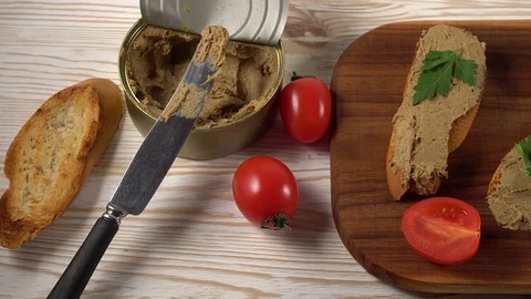 Fresh pate with bread on wooden table Stock Footage 74919109