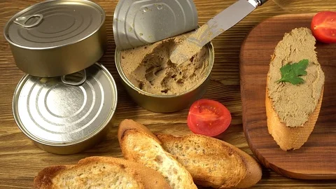 Fresh pate with bread on wooden table Stock Footage 74919465