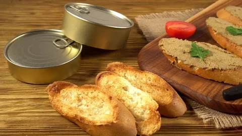 Fresh pate with bread on wooden table Stock Footage 74919817