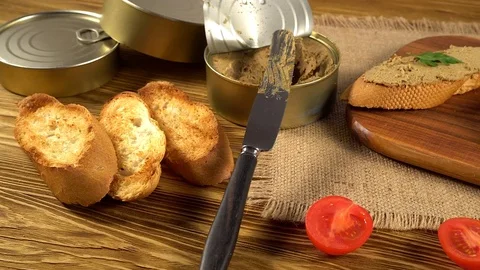 Fresh pate with bread on wooden table Stock Footage 74968918