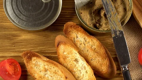Fresh pate with bread on wooden table Stock Footage 74970620
