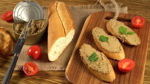 Fresh pate with bread on wooden table Stock Footage 74971633