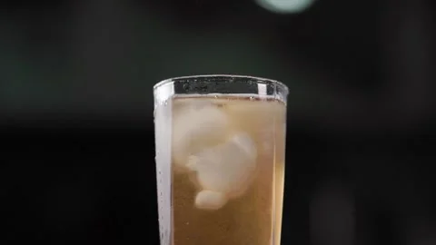 Fresh Peach Extract Juice With Ice Cubes Close Up Bubbles Stock Footage 344050736