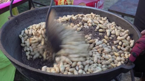 Fresh peanuts being roasted Stock-Footage 329377260