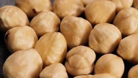 Fresh peeled hazelnut kernels, hazelnuts closeup Video stock 128572655