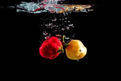 Fresh pepper with water splash Stock Photos