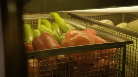 Fresh Peppers in Metal Baskets Under Warm Light in Beijing Restaurant Kitchen Stock Footage 345777724