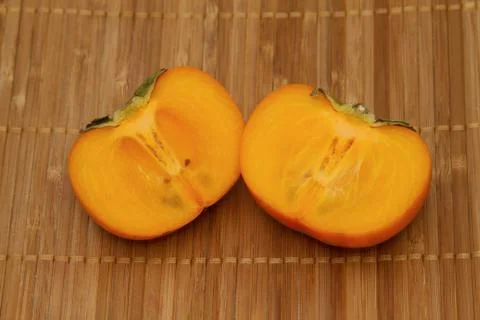 Fresh persimmon fruit slice Foto stock