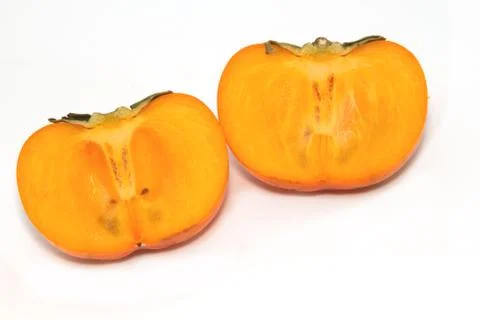 Fresh persimmon fruit slice Stock Photos