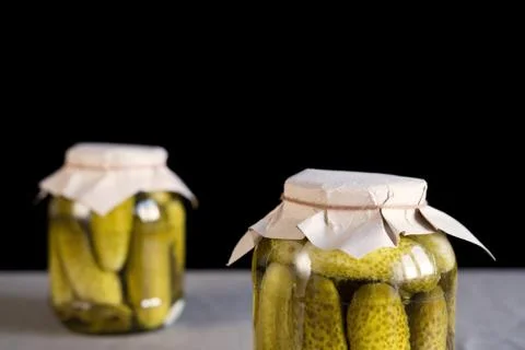 Fresh pickled cucumbers on a table Stock Photos