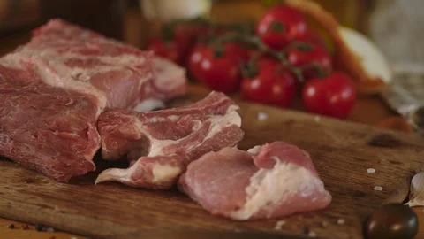 Fresh piece of meat on the kitchen table Stock Footage 125167873