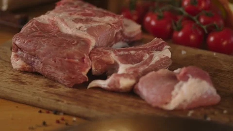 Fresh piece of meat on the kitchen table Stock Footage 125167946