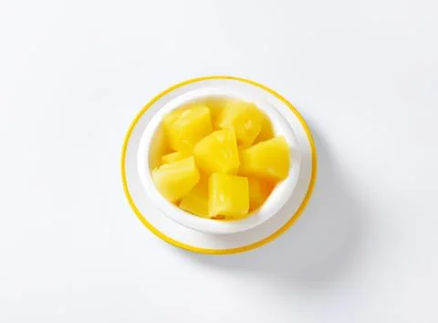 Fresh pineapple chunks in a bowl Stock Photos