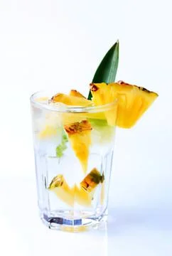 Fresh pineapple chunks in a clear glass Stock Photos