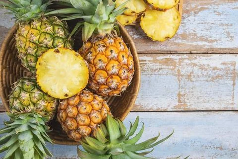.Fresh pineapple fruit in a basket 写真素材