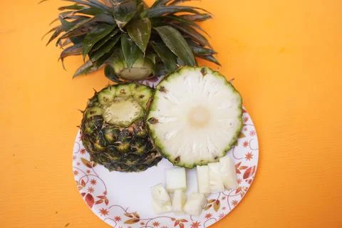 Fresh pineapple fruit with a refreshing smoothie, vibrant tropical drink Fotos Stock