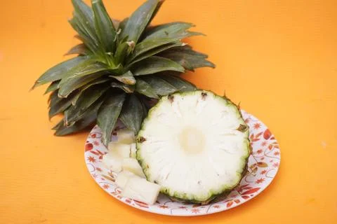Fresh pineapple fruit with a refreshing smoothie, vibrant tropical drink Fotos de archivo