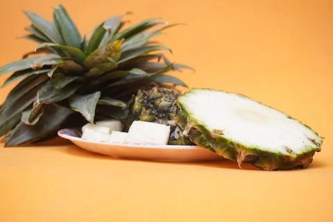 Fresh pineapple fruit with a refreshing smoothie, vibrant tropical drink Фото