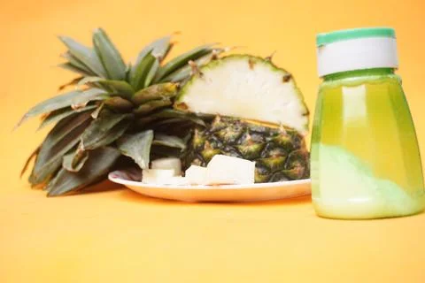 Fresh pineapple fruit with a refreshing smoothie, vibrant tropical drink Stock-Fotos