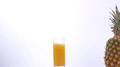 Fresh Pineapple Juice and Pineapple Rotating Stock-Footage 130160541