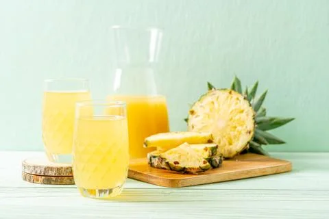 Fresh pineapple juice Stock Photos