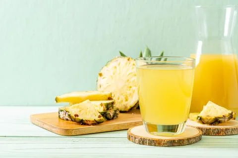 Fresh pineapple juice Stock Photos