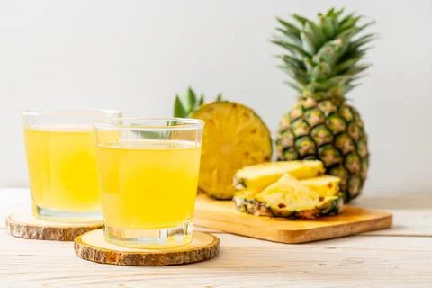 Fresh pineapple juice Stock Photos