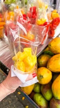 Fresh pineapple in a plastic bag Stock Photos