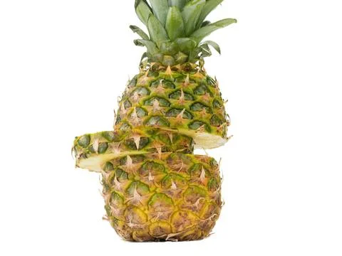 Fresh pineapple with slice in front on white background 写真素材
