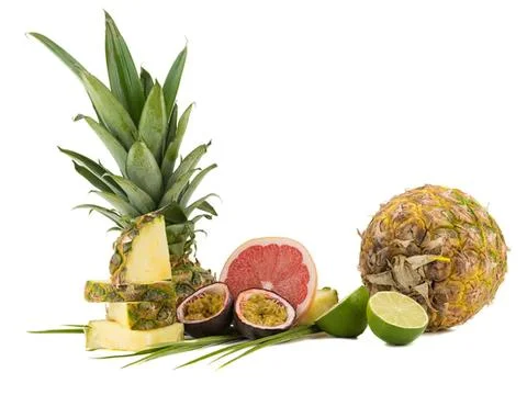 Fresh pineapple, watermelon, lime, and passion fruit on white 写真素材