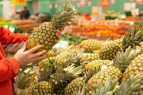 Fresh pineapples, fresh fruit selection Stock Photos