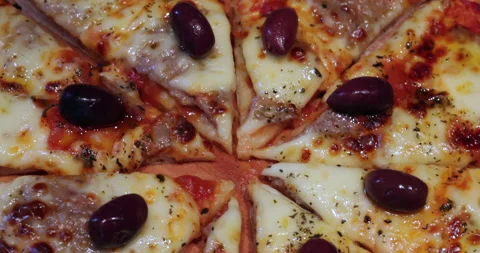 Fresh pizza close-up Stock Footage 182454216