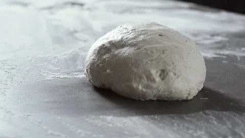 Fresh pizza or bread dough on the kitchen worktop 動画素材 127414577