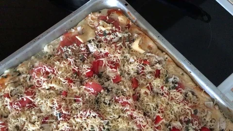 Fresh pizza ready for baking Stock Footage 127344296