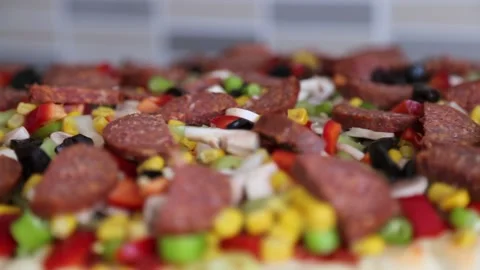 Fresh Pizza Ready For Baking With Sausage And Vegetables Stock Footage 343747008